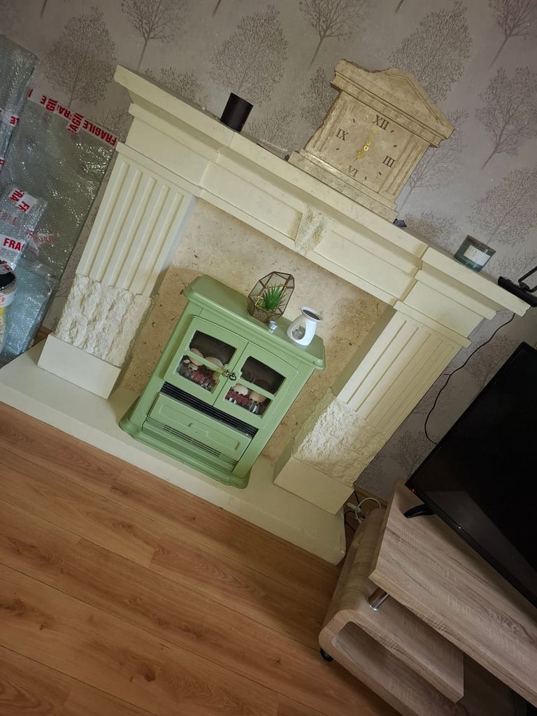 Stone effect fireplace with matching clock,fire & Hearth