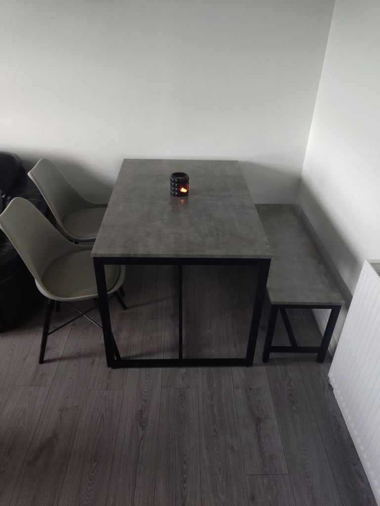 Dining table 2 chairs and a bench grey concrete affect