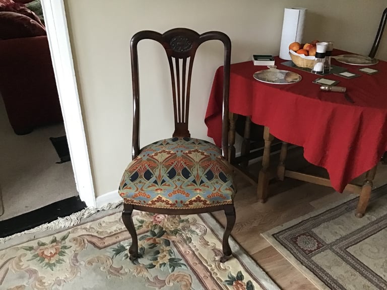 Four antique mahogany dining chairs