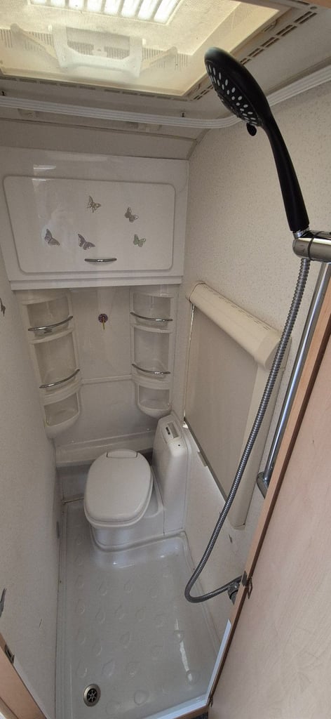 4 berth caravan fixed bed with motor mover 