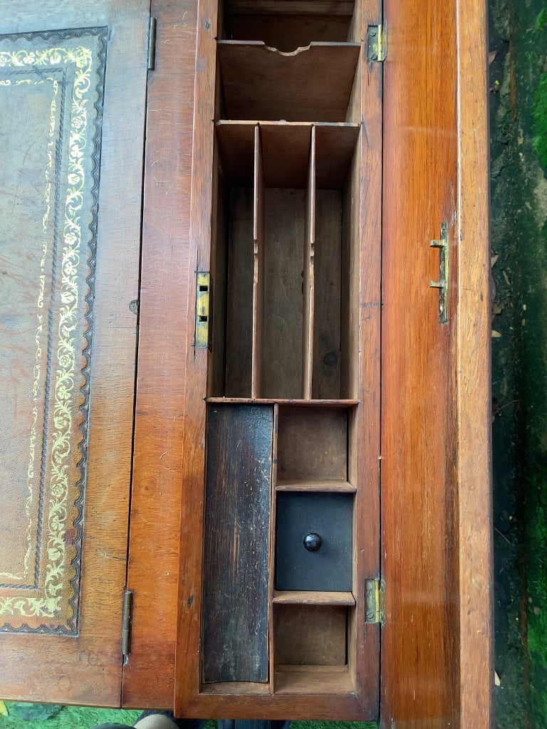Victorian walnut brown leather insert davenport with ink wells & wheel castors