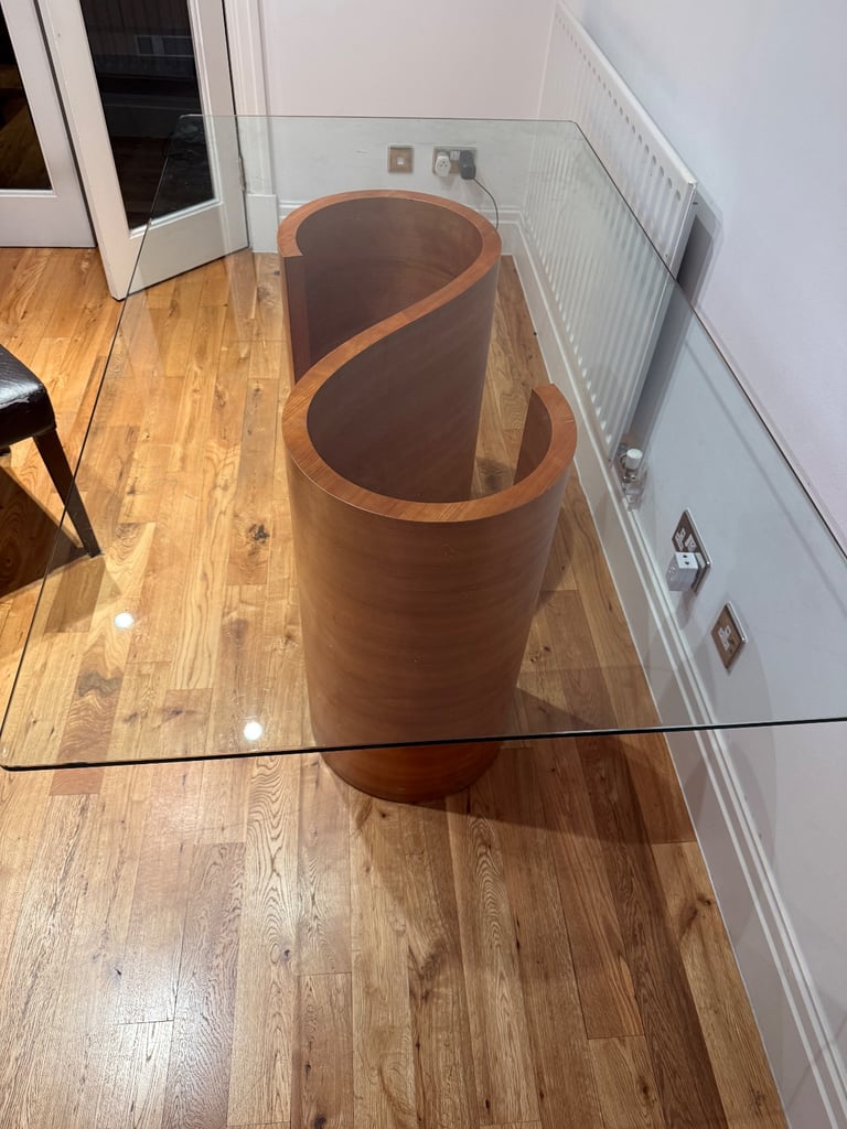 Beautiful wooden and glass dining table 