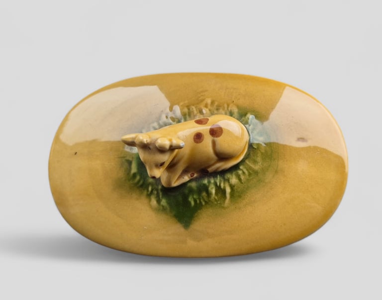 Collector's Guernsey cow butter dish, has 2 small chip round rim not visible when lid is on. 