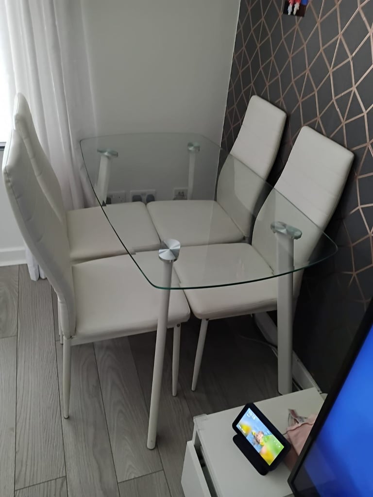 Glass table and 4 chairs