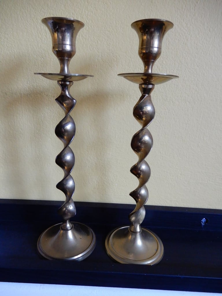 Pair of twisted Indian brass candlesticks