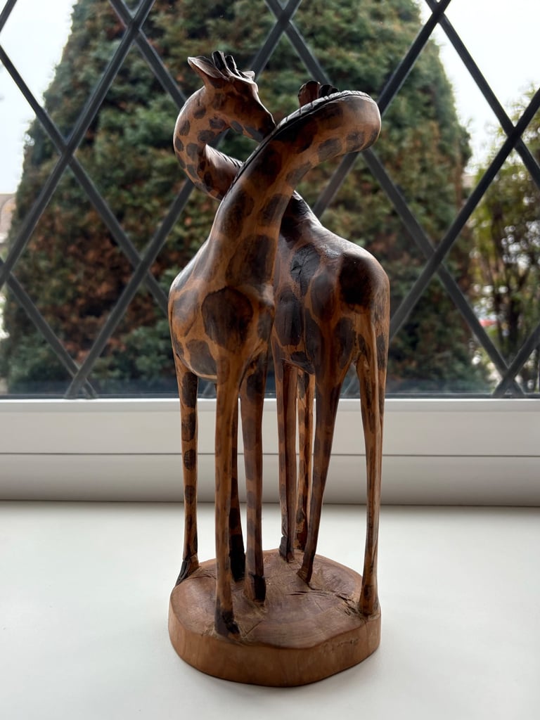 image for Hand-Carved Wooden Giraffe Sculpture