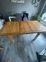 Harveys oak extendable dining room table 
