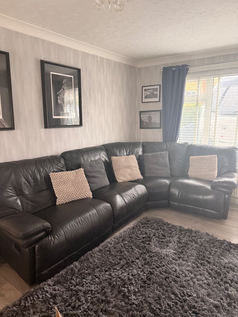image for Large Black leather sofa