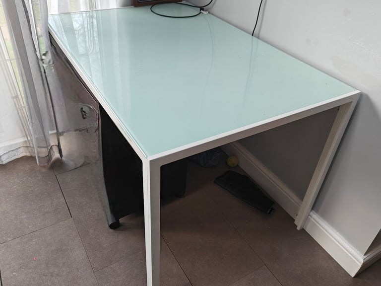 image for Glass top dining table in good condition.