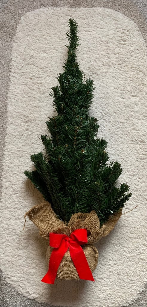 image for Artificial Small Green Christmas Tree on Log Base with Red Bow, 24 inches High, Never Used, £13
