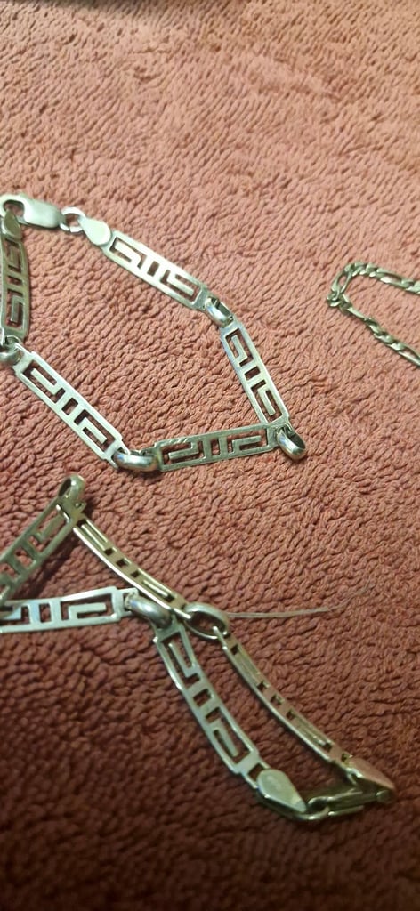 4 silver bracelets and 3 brooches