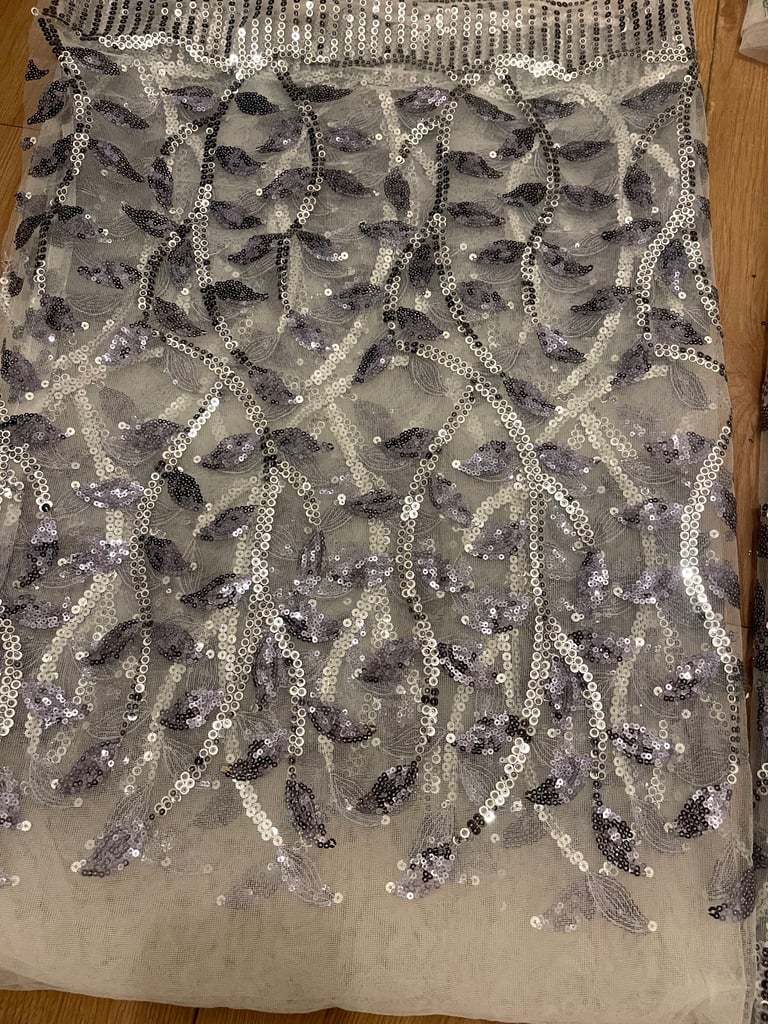 net fabric with blue and silver leaves