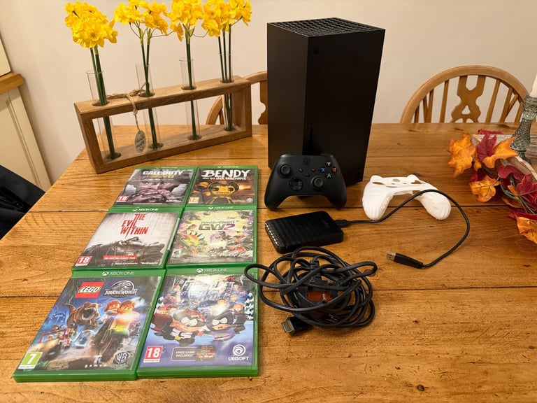 image for Microsoft Xbox Series X console 1TB with controller, games and accessories