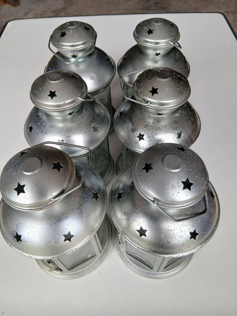 Six garden lanterns with six metal stakes