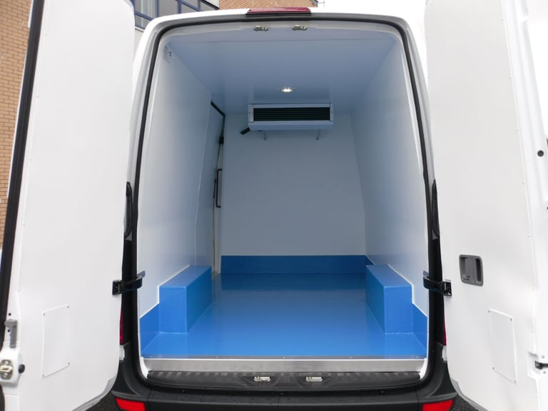MAN AND FRIDGE FREEZER VAN