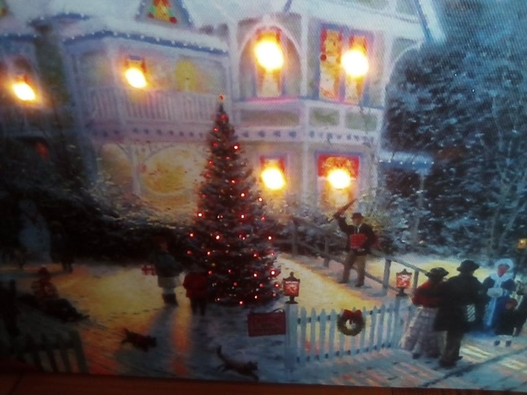 Attractive battery operated Christmas canvas picture plaque, with inset flickering lights.