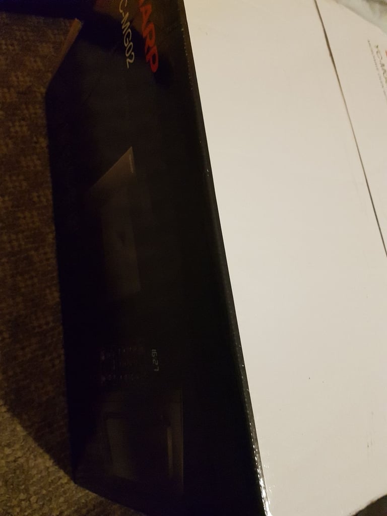Brand-new microwave for sale 