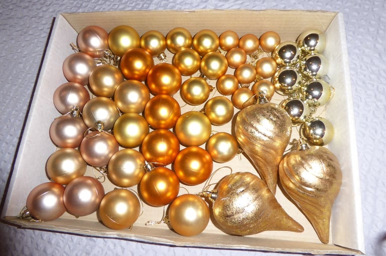 50 Assorted, gold coloured Christmas baubles. £2
