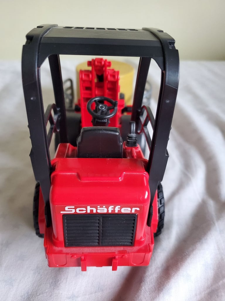 Bruder Farm Vehicle Digger With Hay Bale