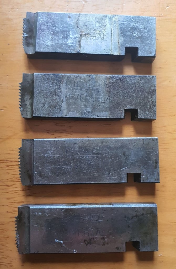 image for For sale is a set of RIDGID Pipe Dies for use in British Universal Die Heads