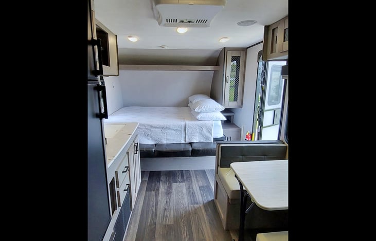 Queen size Murphy bed with extra padding added. Storage above, and beside the bed. 2-Plug outlet.