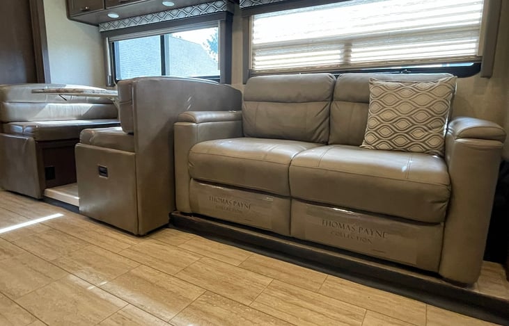 Thomas Payne Trifold Couch also opens up to a bed.