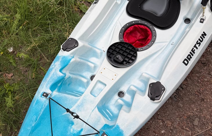 Front kayak half with dry hold space open.