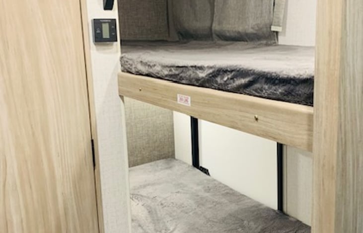 2 lighted bunks with USB/outlet.