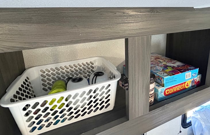 This RV has overhead and outdoor lighting but we've provided several lanterns and a few games for the family to enjoy.