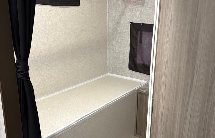 Rear bunk area has been turned into larger walk-in closet area.