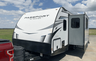 Sporty Little Giant Keystone RV Passport sleeps 7