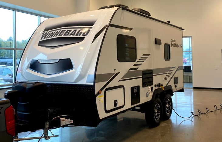 Lightweight and easy to tow! Pass through storage access on both sides, and an outdoor shower!