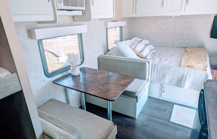 Table bed and queen size bed ready for a restful night's sleep!