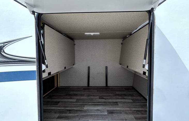 The back bunks can fold up for storage of bikes or other equipment.