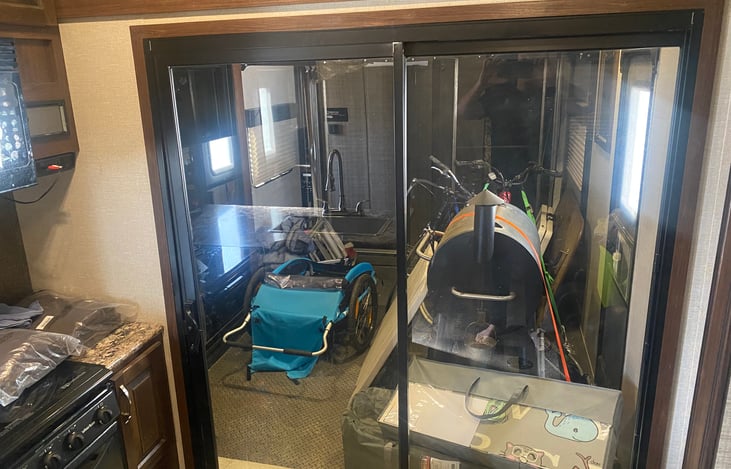 Garage ready to go. Can fit a stock RZR 4 seater up to 2020 I believe. Confirm the length before booking.