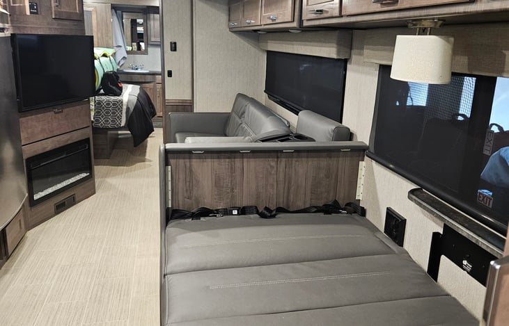 Dining table collapsed to make one more sleeping spot.