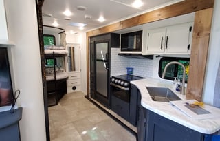 The Happy Camper | Bunks & Upgraded Queen Mattress