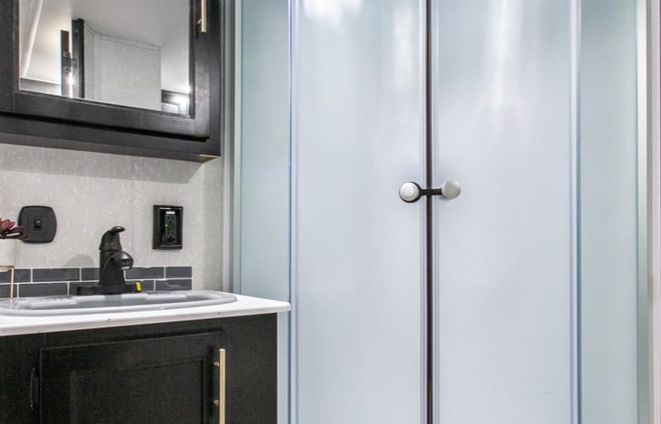 S
Large, tall shower and bath