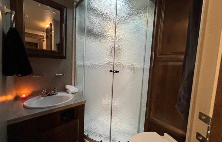 Full bathroom complete with shower, and sink