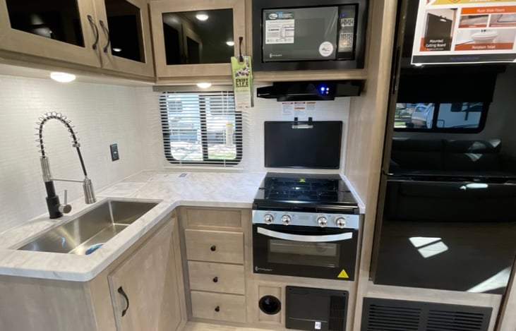 Comes equipped with pots & pans, an air dryer and basic utensils.