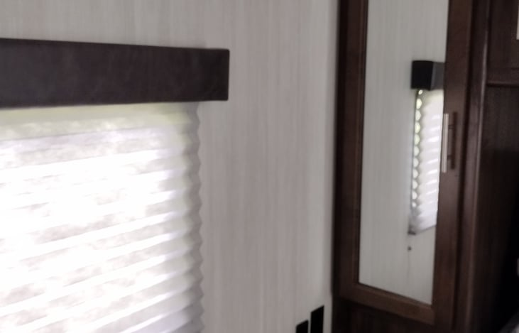 Side closet and windows to watch the sunrise in the mornings.