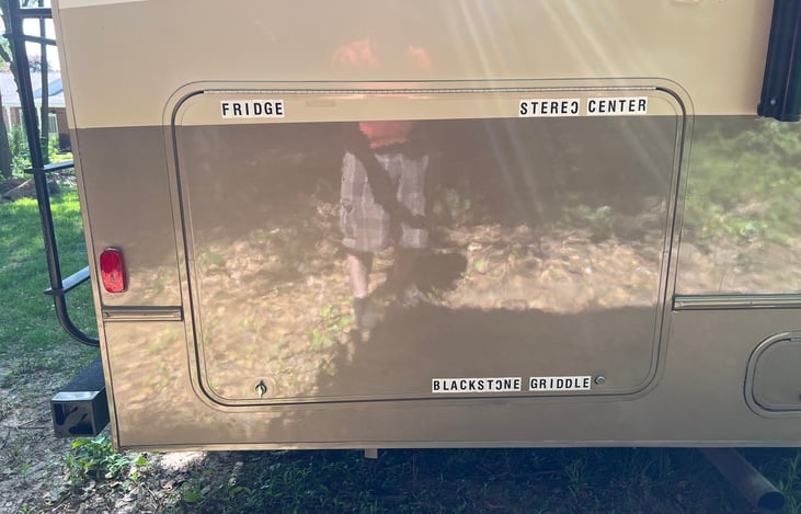 Outside fridge, Entertainment Center with exterior speakers, Blackstone Griddle and storage