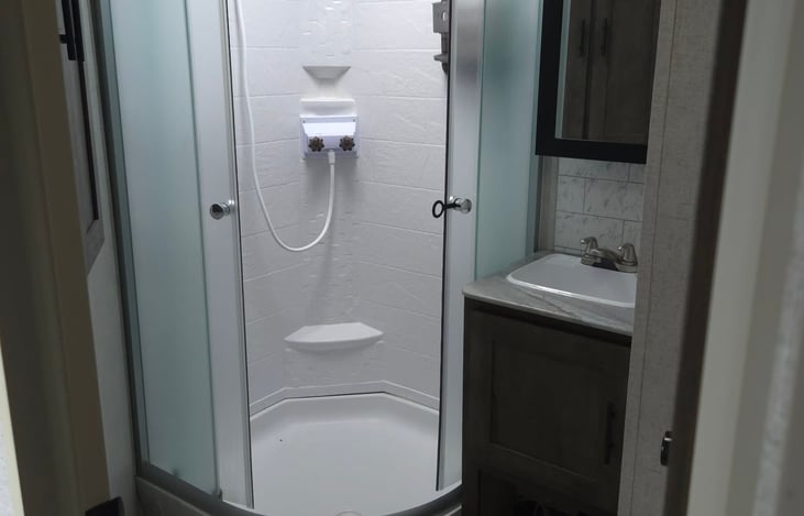 Spacious bathroom a full sized adult can comfortably change in!