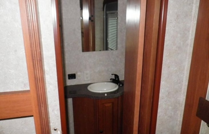 Bathroom with private door to bunkhouse and outside