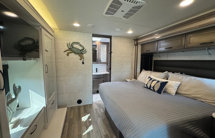 Master bedroom with king bed, full bath and plenty of storage