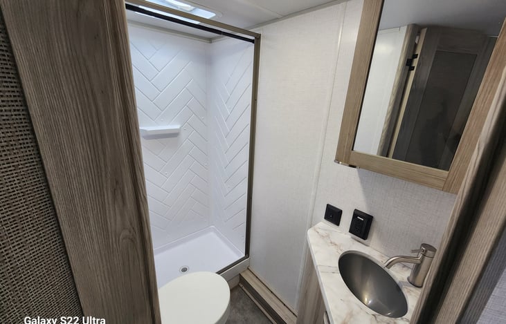 Full Bathroom with stand up shower. The bath room can easily fit a 6 foot tall adult.