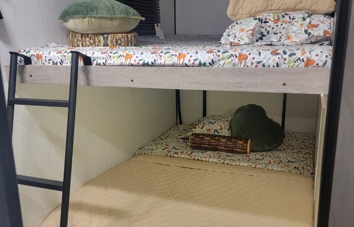 Full sized top bunk