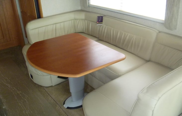 Drop down dinette table makes into a double bed.