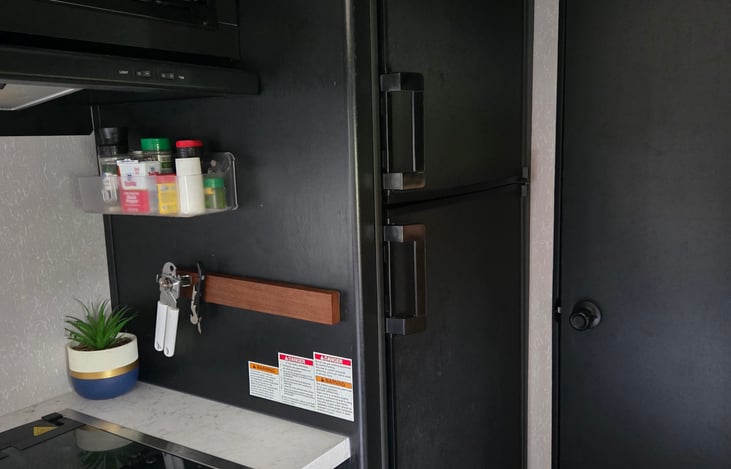 Fridge, freezer and double gas burner.