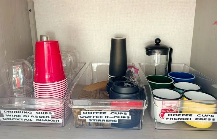 Kitchen cupboards are organized and well stocked with all the cooking essentials you will need.
